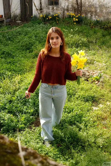 Spanish Beauty Poses in Her Clothes
