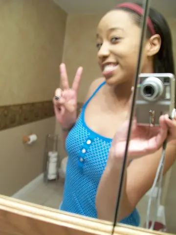 Pradah G – Ebony Brunette Spreads Her Shaved Pussy in a Selfie