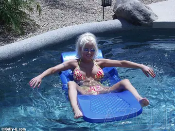 Kelly Erickson – Slim Blonde Shows Her Huge Fake Tits and Tattoo by the Pool