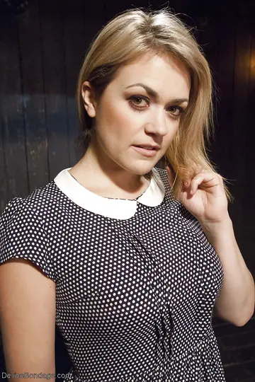 Winnie Rider – Curvy Blonde with Big Tits and Glasses Plays with a Dildo While Bound