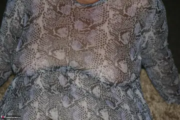 BBW Redhead Strips Out of Her Dress and Spreads Her Shaved Pussy