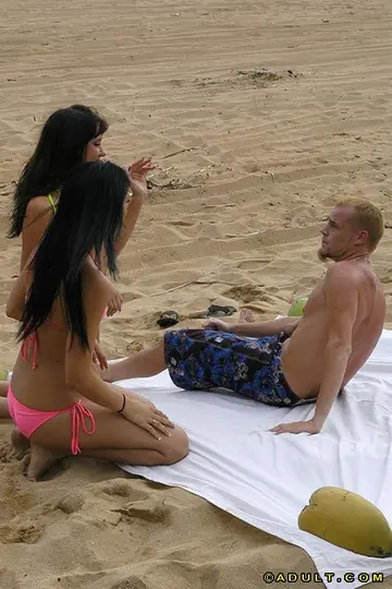 Brodi – Brunette in a Bikini Joins a Threesome on the Beach