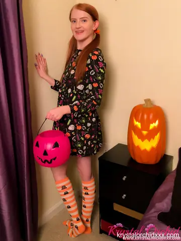 Krystal Orchid – Slim Pale Redhead Lifts Her Dress and Fingers Her Pussy in Socks for Halloween