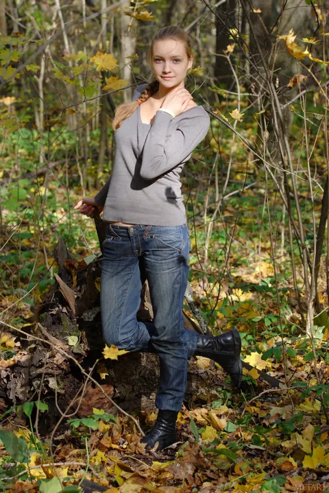 Woman in Pigtails Strips Out of Her Jeans in the Woods – photo 2 of 20