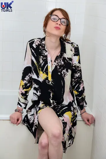 Trans Woman Strips Out of Her Dress and Poses Naked