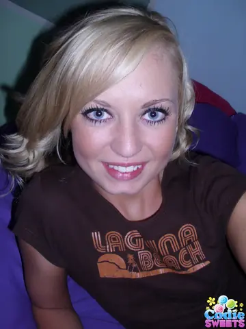 Skinny Blonde Spreads Her Pussy in a Bedroom Selfie