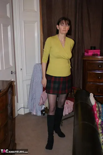 Mature Woman in Lingerie and Boots Toys Her Hairy Pussy