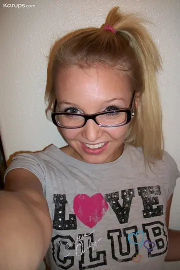 Blonde in Glasses Takes Selfies in a Bikini