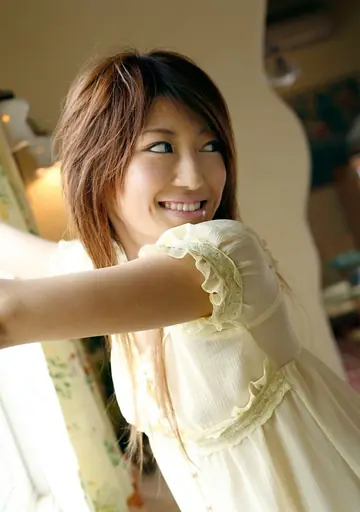 Yu Satome – Slim Japanese Redhead Poses in a Skirt and Thong