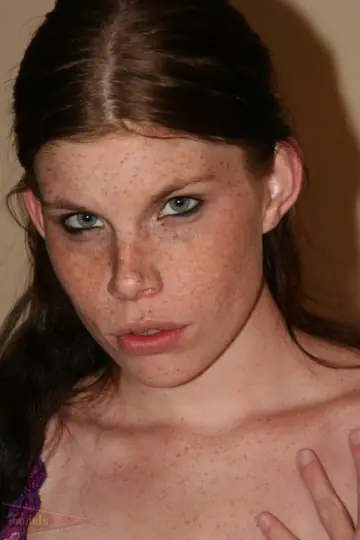 Thick Redhead Peels Off Her Lingerie and Spreads Her Shaved Pussy on the Bed
