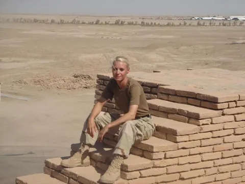Blonde in a Military Uniform Strips Nude – photo 13 of 15