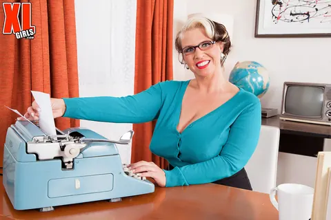 Channel Sweets: BBW MILF Secretary Shows Her Huge Tits at the Office – photo 1 of 16
