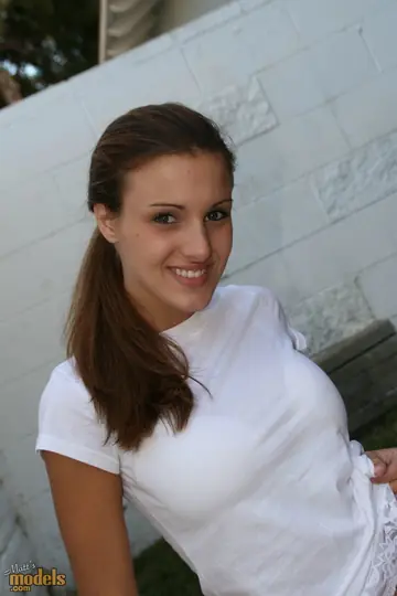 Andie Valentino – Busty Brunette Strips Out of Her Skirt on a Towel Outdoors