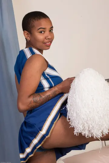 Ebony Woman with Shaved Head Spreads Her Holes