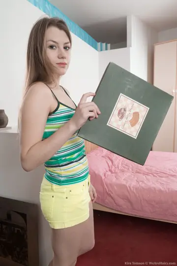 Kira Tomson – Brunette Strips Naked to Show Her Hairy Bush and Spreads Her Pussy
