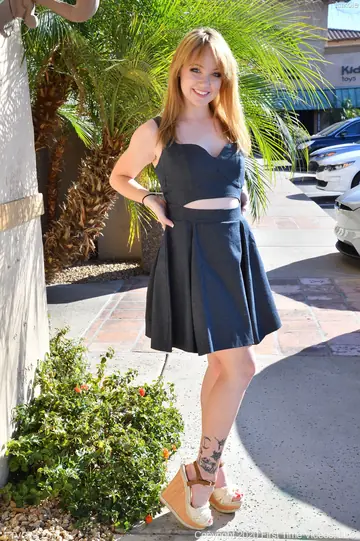 Redhead Sticks a Banana in Her Juicy Pussy Outdoors in a Skirt