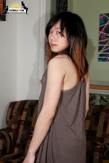 Petite Asian Trans Woman Strips Nude and Poses to Show Her Cock