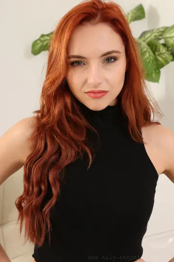 Slim British Redhead Strips Out of Her Uniform in the Office
