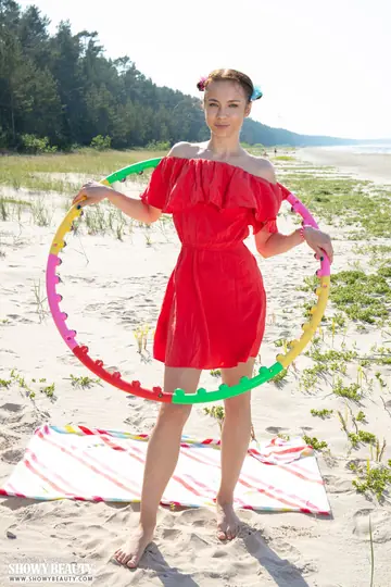 Skinny Woman Strips Out of Her Robe and Spreads on the Beach