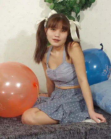 Thai Brunette Flashes Her Big Tits and Panties