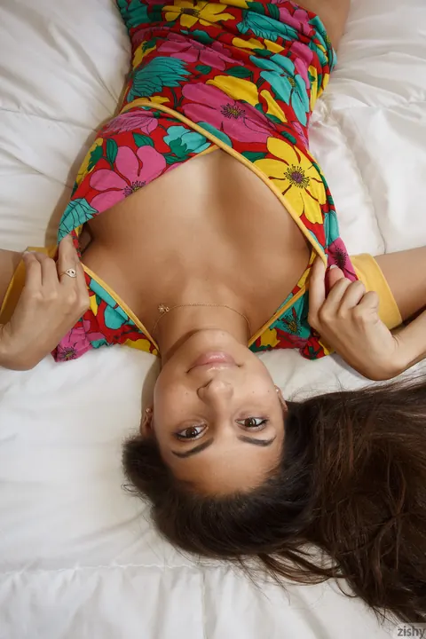 Nina North: Petite Brunette Poses on the Bed in Her Clothes – photo 8 of 11