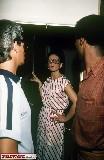 Woman in Stockings and Glasses Takes Interracial Threesome Facial