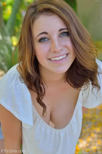 Redhead Masturbates with a Dildo on a Public Bench