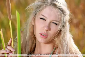Tall European Blonde Shows Her Big Natural Tits in Wild Grass