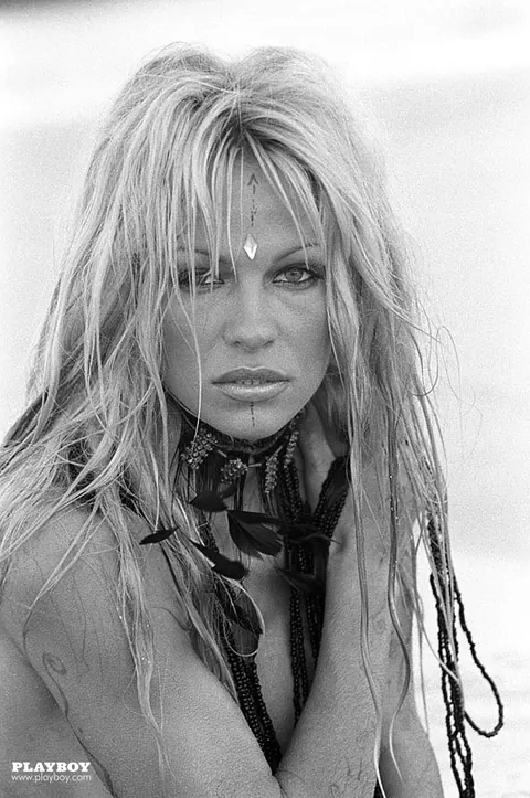 Pamela Anderson: Tattooed Blonde MILF Flaunts Her Big Tits Outdoors – photo 1 of 16