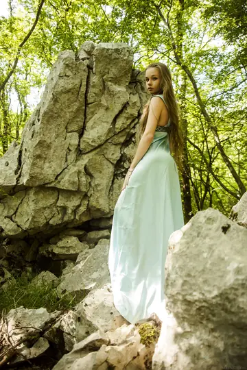Blonde in a Dress Fingers Her Hairy Pussy in the Forest