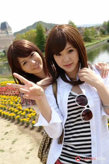 Asian Lesbians Kiss and Make Out Outdoors in Skirts and Heels