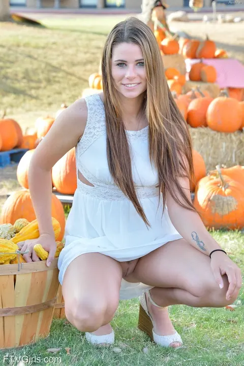 Aveline Kristie: Brunette with Piercings Spreads Her Legs Outdoors in a Short Skirt – photo 2 of 16