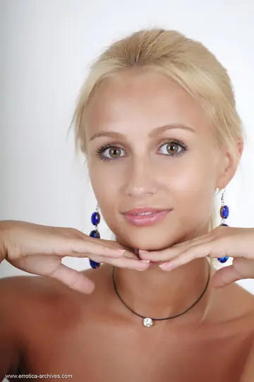 Blonde European Woman Spreads Her Shaved Pussy