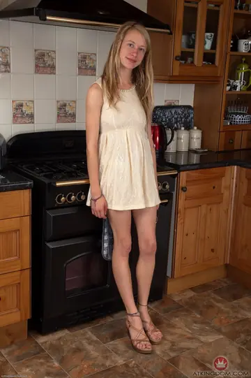Woman with Small Tits Spreads Her Hairy Pussy in the Kitchen