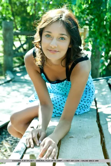 Chandra A – Slim Short-Haired Brunette Pulls Her Panties Aside Outdoors