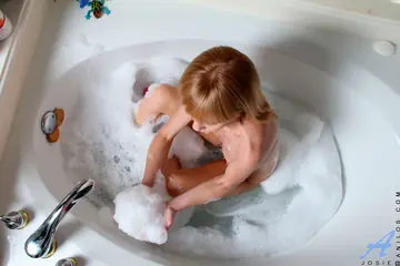 Busty Redhead Trans MILF Toys Her Pussy in the Bathroom