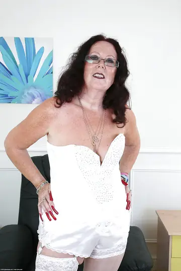 Zadi – Ebony MILF in Stockings and Glasses Spreads Her Ass