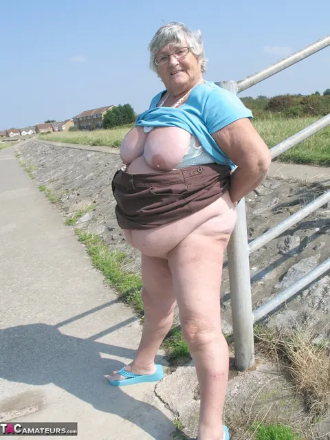 BBW Blonde Poses Nude on a Bike Path – photo 16 of 20