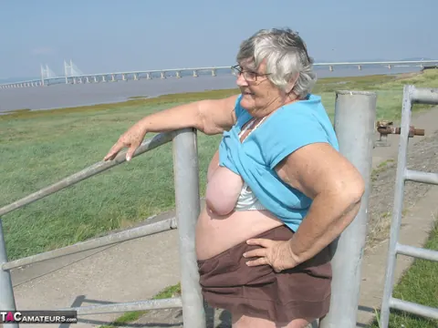 BBW Blonde Poses Nude on a Bike Path – photo 19 of 20
