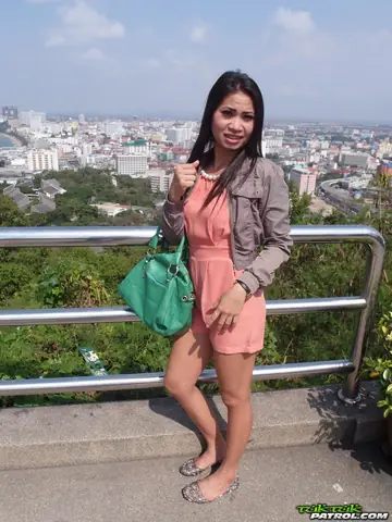 Thai Amateur Undresses and Poses Nude Outdoors