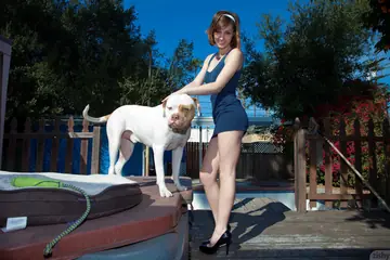 Erica Rempel – Redhead in a Short Dress Spreads Outdoors