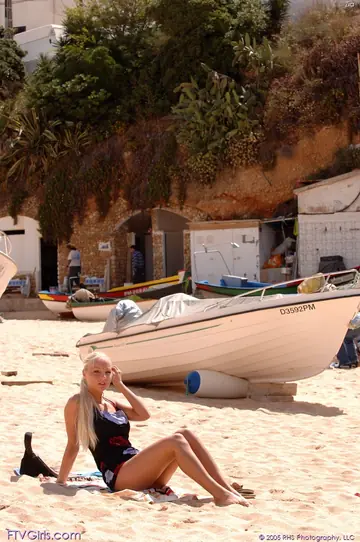 Busty Blonde Czech Strips Out of Her Bikini and Spreads