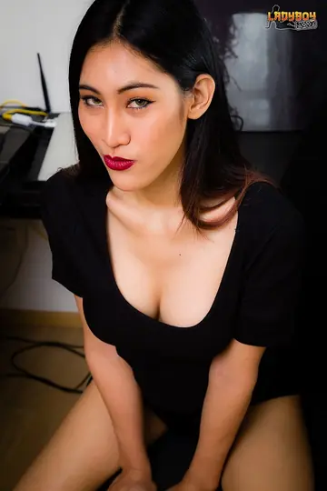 Asian Trans Woman Undresses and Poses Nude Arching Back