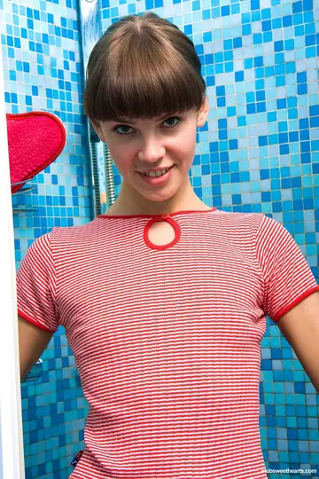 Skinny Brunette Shows Her Small Tits and Big Ass in the Bathroom