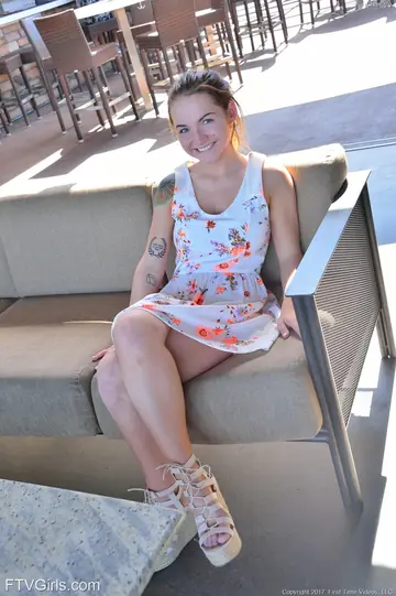 Busty Tattooed Babe Strips Nude in High Heels Outdoors
