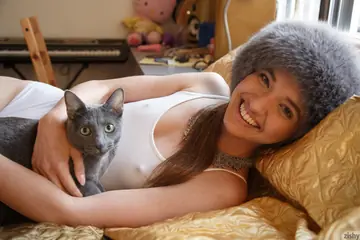 Slim Russian Brunette Shows Her Small Tits and Ass in a Bikini and Heels