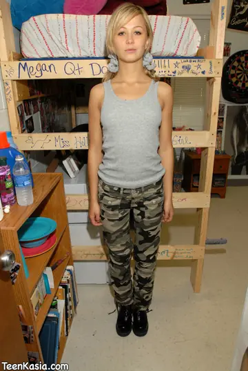 Blonde in Boots Pulls Down Her Pants and Poses