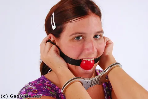 Redhead in Pigtails Handcuffed and Ball-Gagged – photo 4 of 16