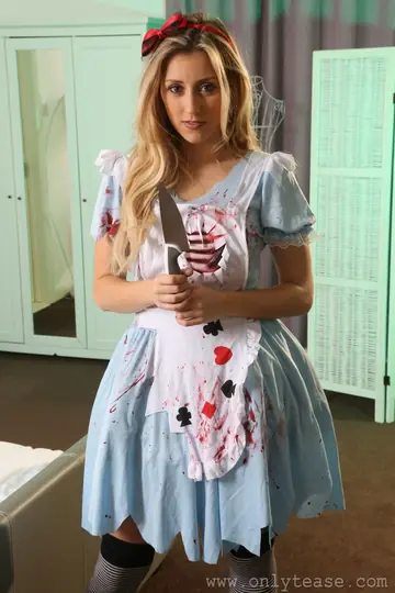 Blonde with Short Hair Strips Out of Her Costume in Stockings