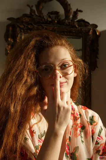 Busty Petite Redhead in Glasses Poses Nude in Outdoor Bath